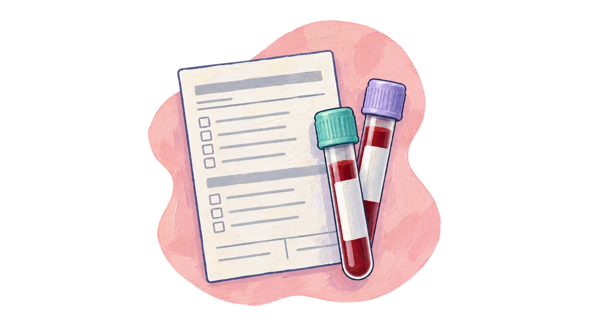 Blood sample tubes beside a laboratory testing form